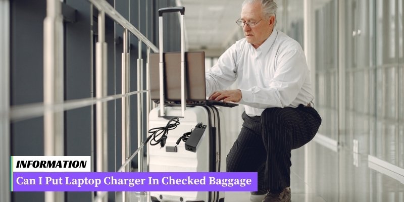 A laptop charger packed in checked baggage. Ensure it complies with airline regulations for safe transportation.