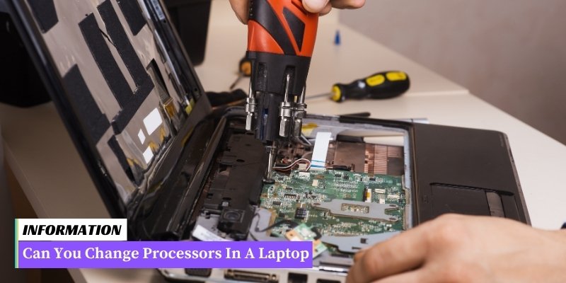 A person skillfully repairs a laptop using a screwdriver.