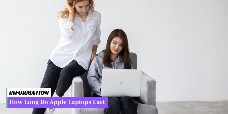 Two women sitting on a couch, discussing the durability of Apple laptops and their lifespan.